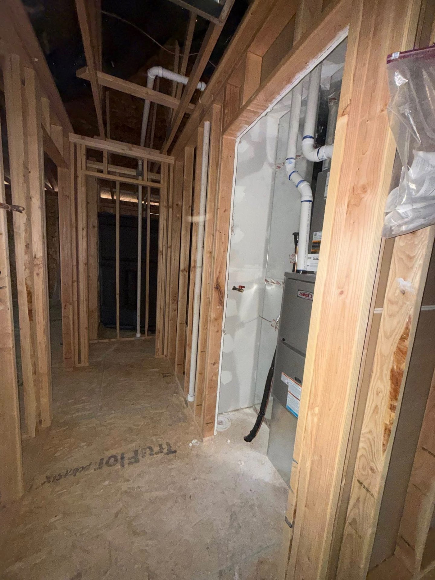 Rough-in plumbing and mechanical room during new construction