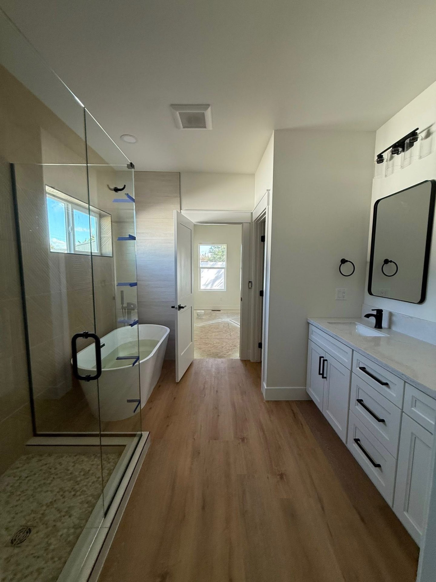 Master bath build with freestanding tub and walk-in shower